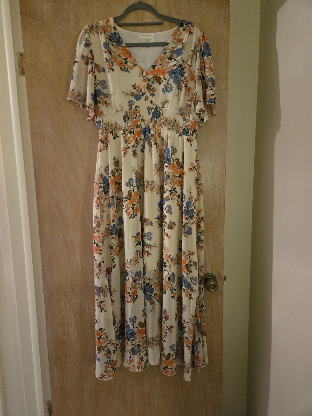 Floral Cream V-Neck Maxi Dress with Orange & Blue Print